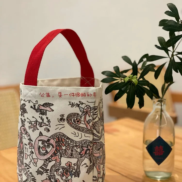 点亮创业的星⭐：“万物缘”帆布手拎包 孤独症青年艺术家作品